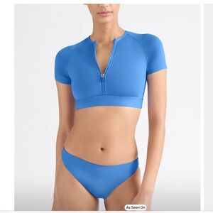 Knix short sleeve zipped cropped swim top